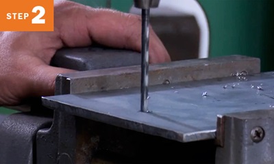 drilling a hole in metal